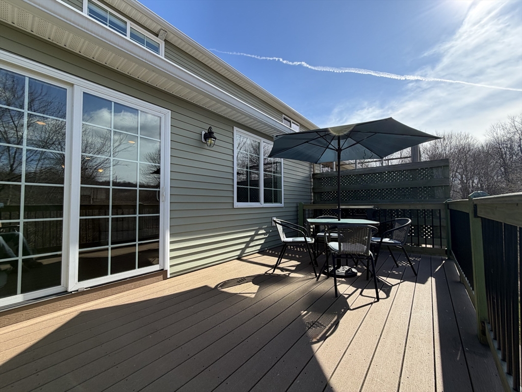 353 Fuller Street, Unit 6 Ludlow, MA 01056 - Photo 4 of 30 a house view with a seating space