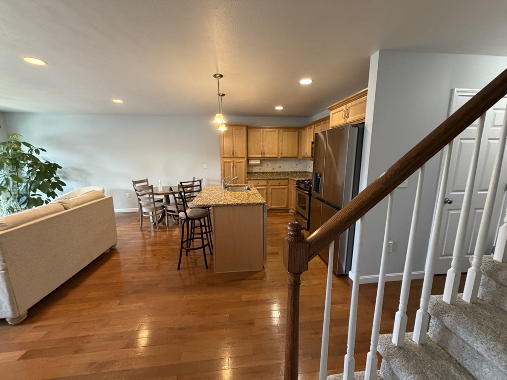 353 Fuller Street, Unit 6 Ludlow, MA 01056 - Photo 9 of 30 a view of dining room with furniture and lots of furniture