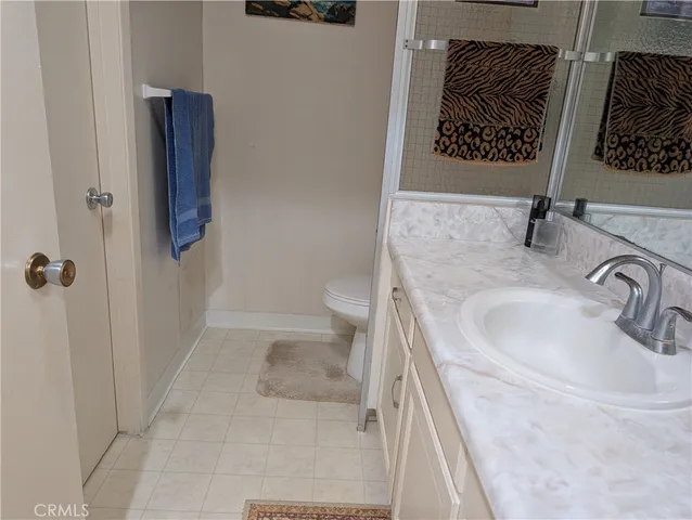 a bathroom with a sink and toilet