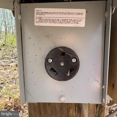 a swimming pool with outdoor seating and yard