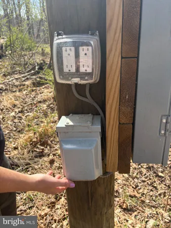 a view of a swimming pool with a table and chairs