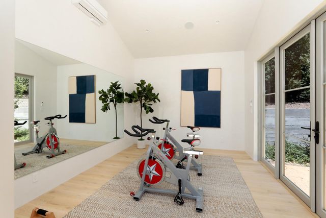 a view of a patio with a table and chairs