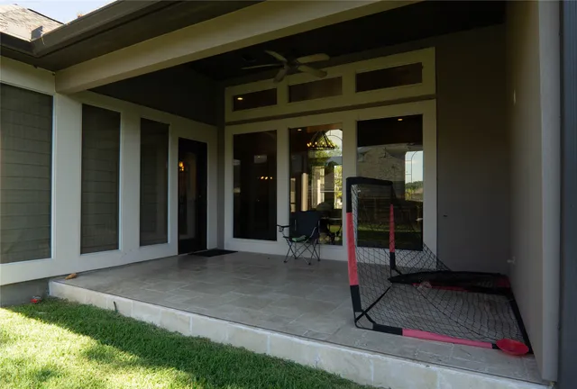 a view of a room with wooden floor and chair