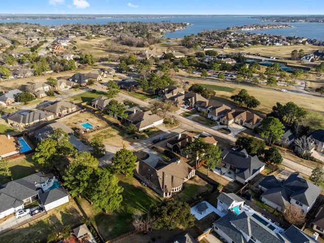 an aerial view of residential building with parking space