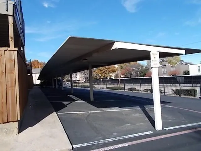 an aerial view of a house with a city view