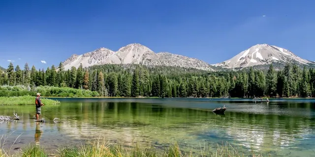 a view of a lake with a mountain in the background