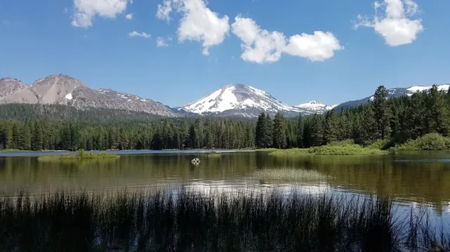 a view of a lake with a mountain in the background