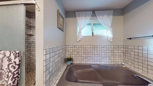 a bathroom with a bathtub