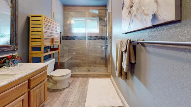 a bathroom with a sink and a shower