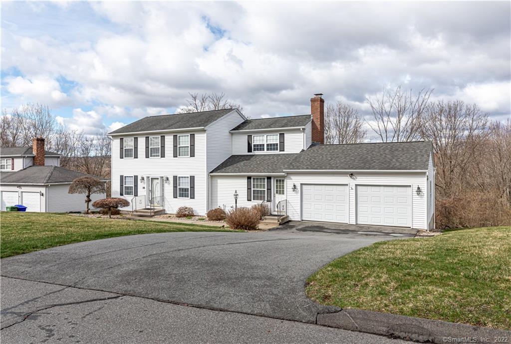 16 Meadow Road Cromwell, CT 06416 - Photo 1 of 1 a front view of a house with garden