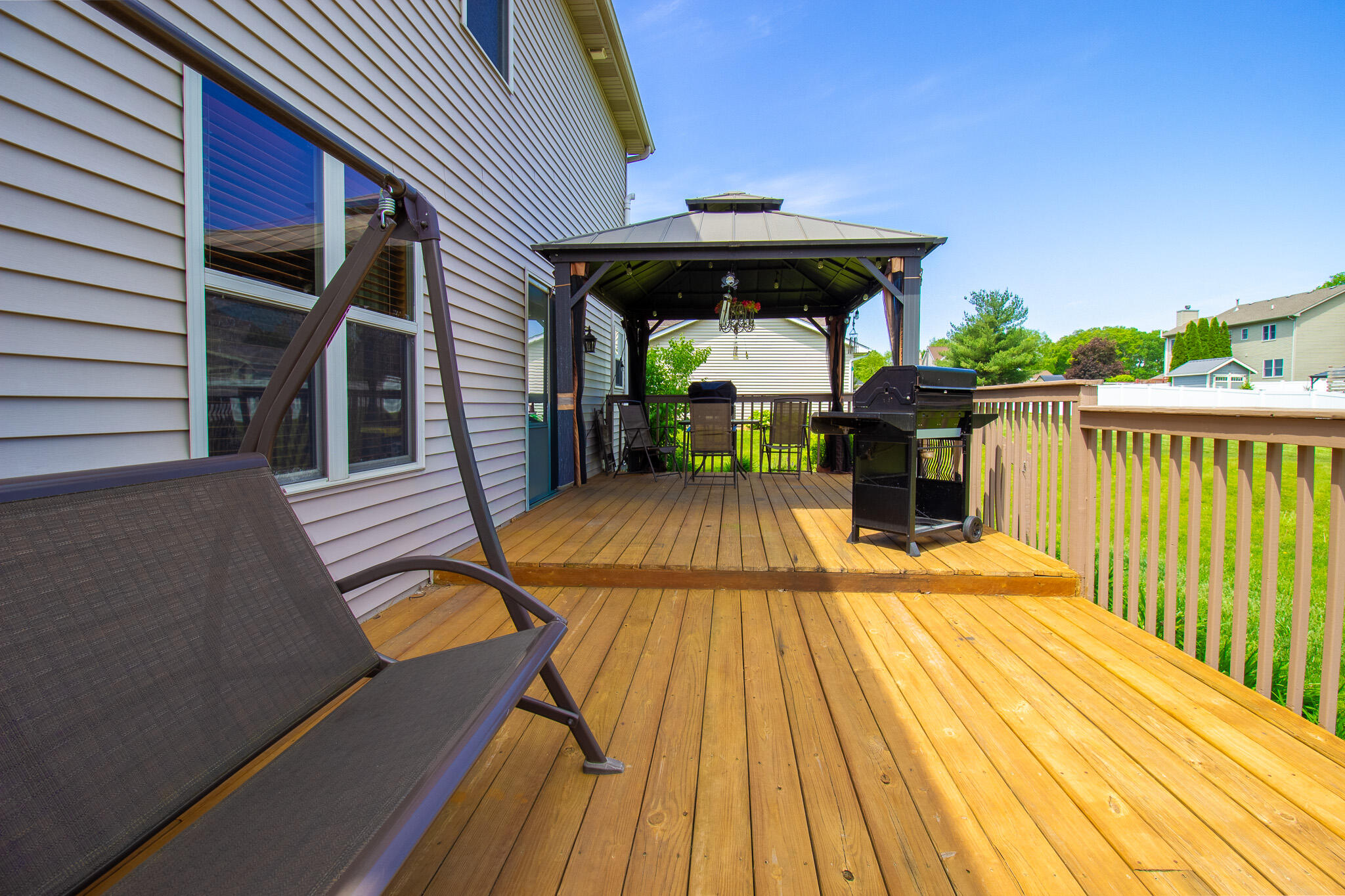 2550 Honelee Court Valparaiso, IN 46385 - Photo 35 of 37 a view of outdoor seating space with wooden floor