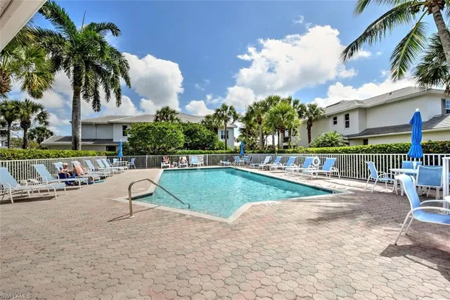 a view of a hallway with a chandelier