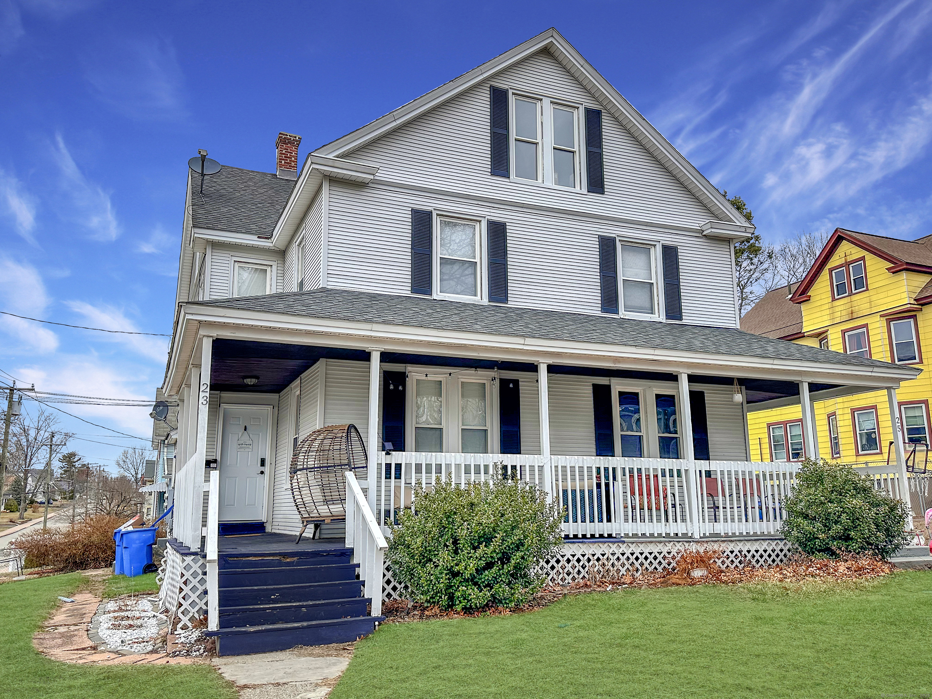 23 Knighton Street Manchester, CT 06040 - Photo 1 of 1 a front view of a house with garden