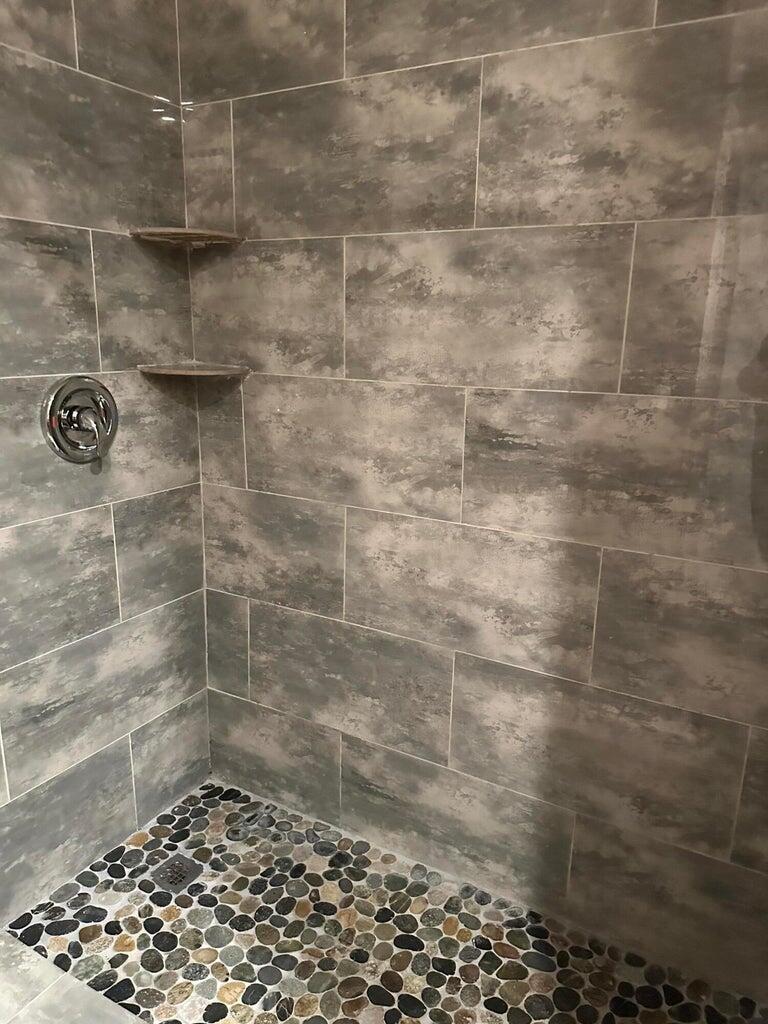 300 Northeast 42nd Street Boca Raton, FL 33431 - Photo 18 of 53 a bathroom with a shower