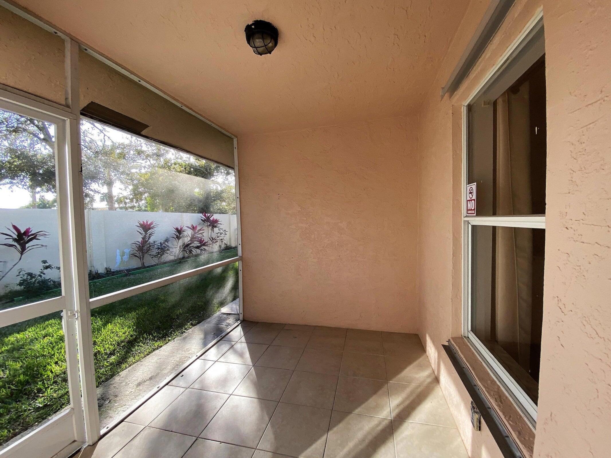 300 Northeast 42nd Street Boca Raton, FL 33431 - Photo 37 of 53 a view of a porch