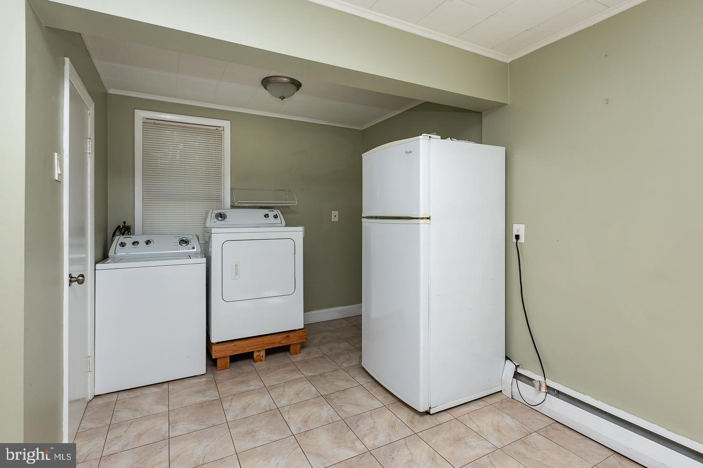 334 East Conestoga Road Wayne, PA 19087 - Photo 18 of 38 Washer and dryer in the kitchen area