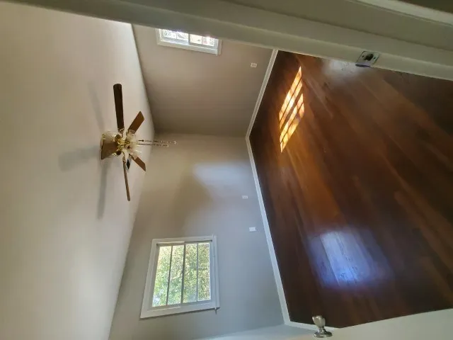 a bathroom with a sink and a window