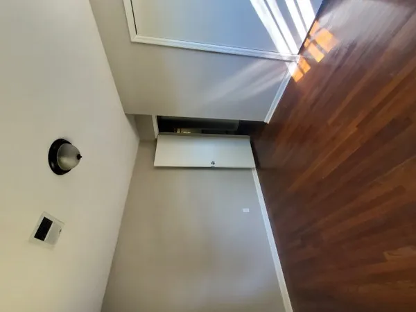 an entryway of a house with a sink