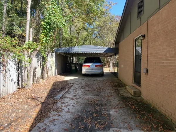 a car parked in front of a house