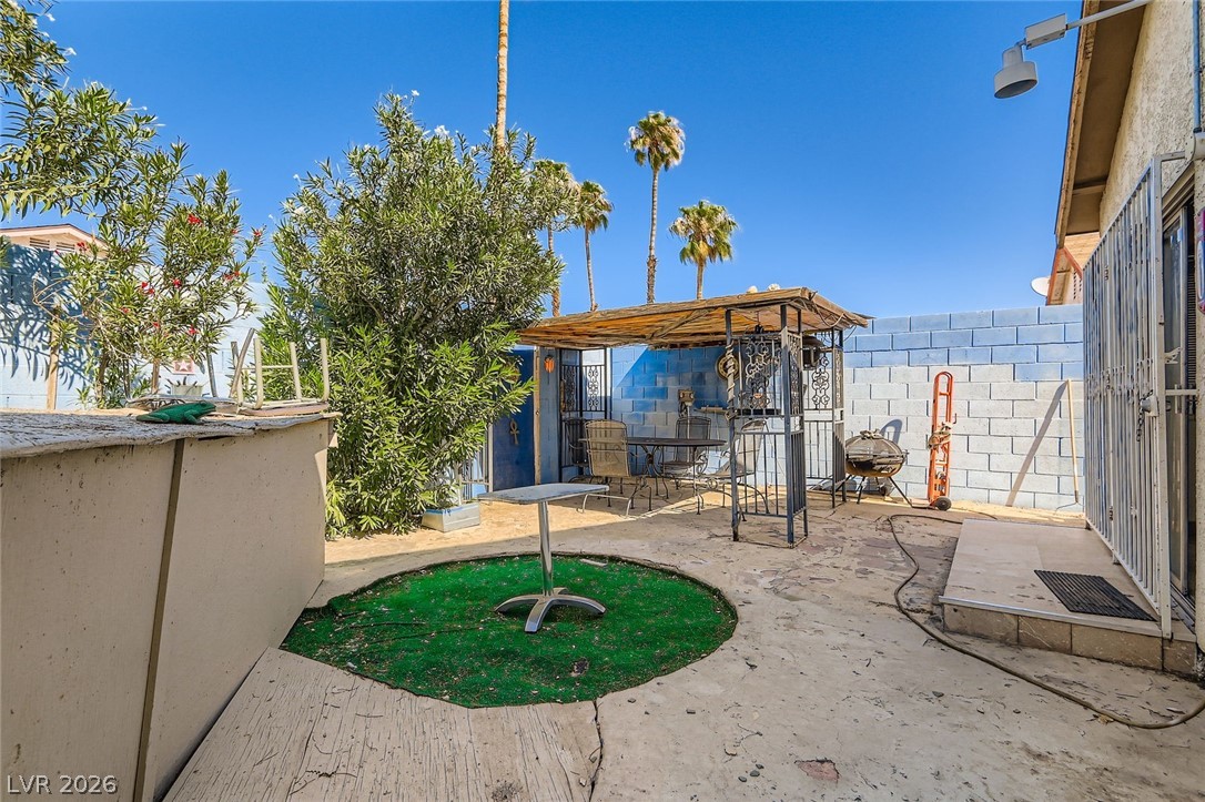 4723 Desert Vista Road Las Vegas, NV 89121 - Photo 29 of 29 View of yard with a patio