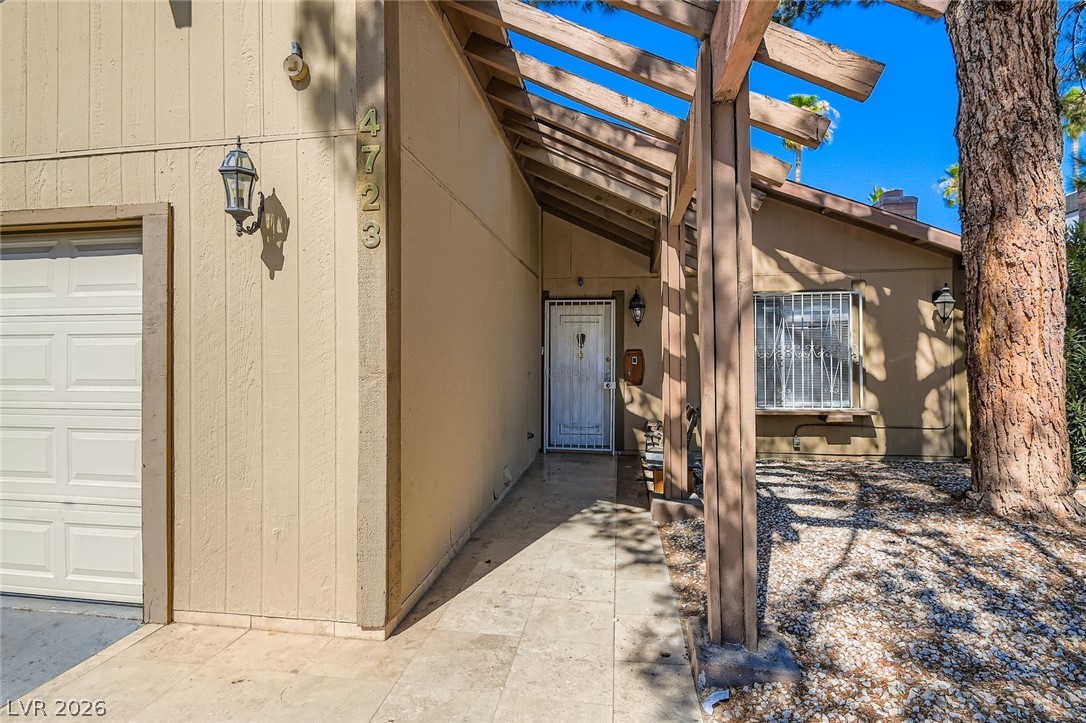 4723 Desert Vista Road Las Vegas, NV 89121 - Photo 4 of 29 Entrance to property with a garage