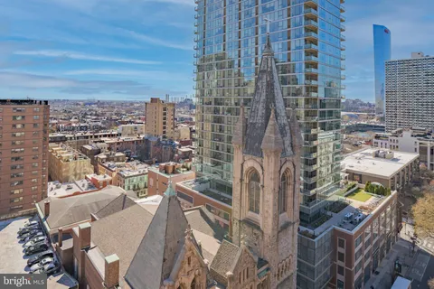 a view of a city with tall buildings