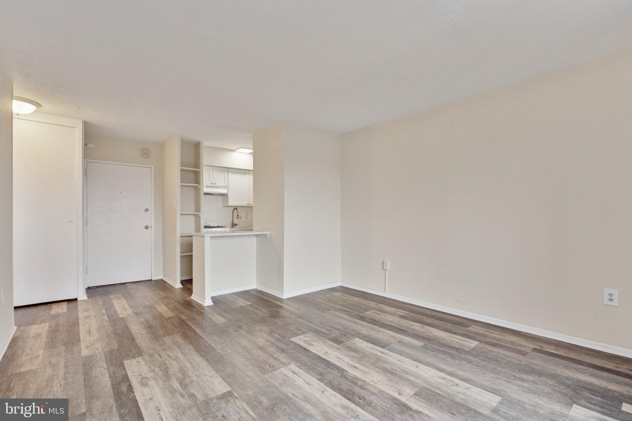 2101 Chestnut Street, Unit 1610 Philadelphia, PA 19103 - Photo 5 of 15 a view of empty room with wooden floor