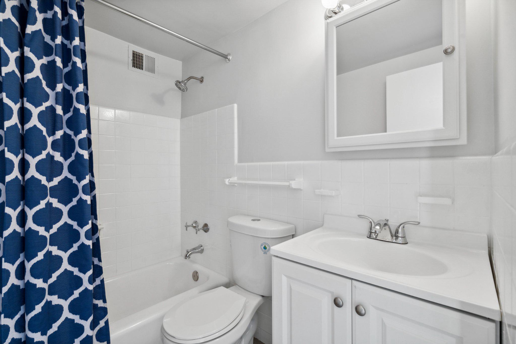 2101 Chestnut Street, Unit 1610 Philadelphia, PA 19103 - Photo 10 of 15 a bathroom with a sink toilet and shower