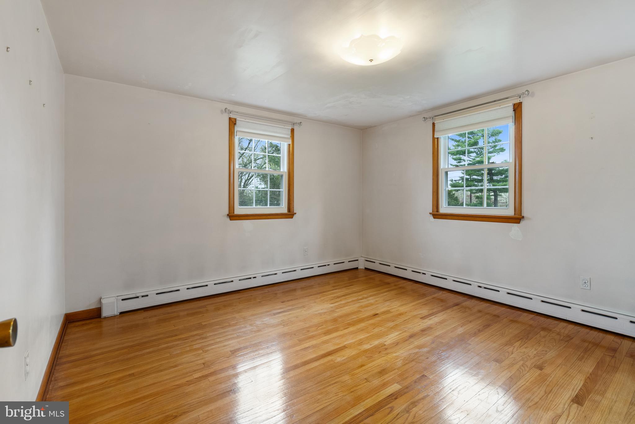 33 Derstine Road Hatfield, PA 19440 - Photo 25 of 32 a view of a room with wooden floor and windows