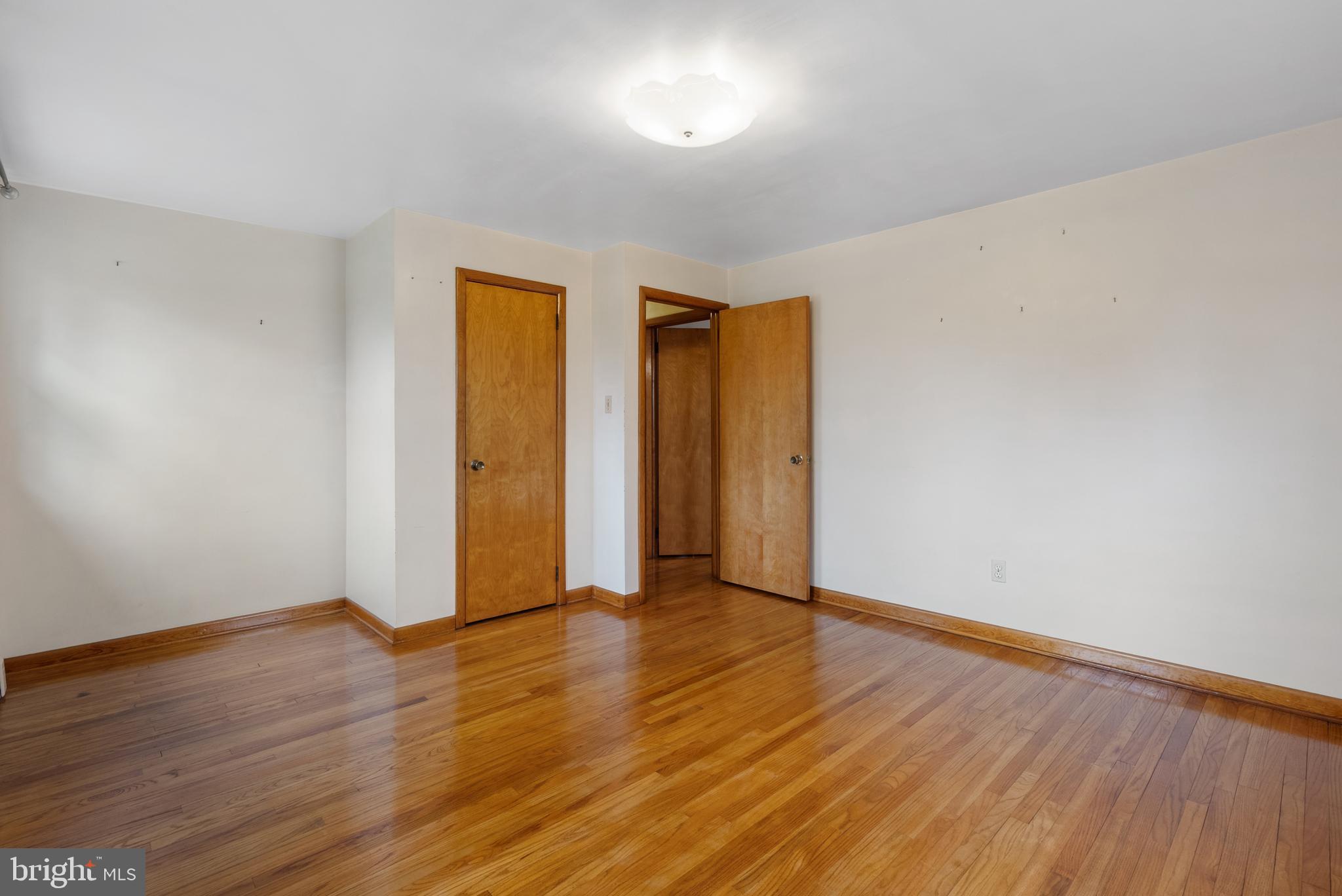 33 Derstine Road Hatfield, PA 19440 - Photo 26 of 32 a view of an empty room with wooden floor