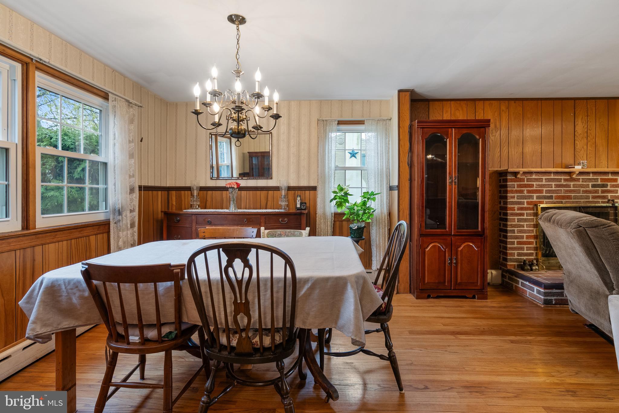 33 Derstine Road Hatfield, PA 19440 - Photo 7 of 32 a view of a dining room with furniture window and wooden floor