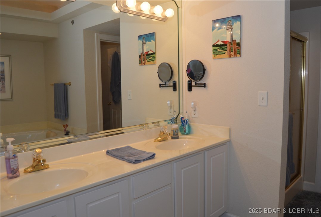 68 Lighthouse Road, Unit 133 Lake Ozark, MO 65049 - Photo 12 of 38 Double vanity for you to get ready for a day at th