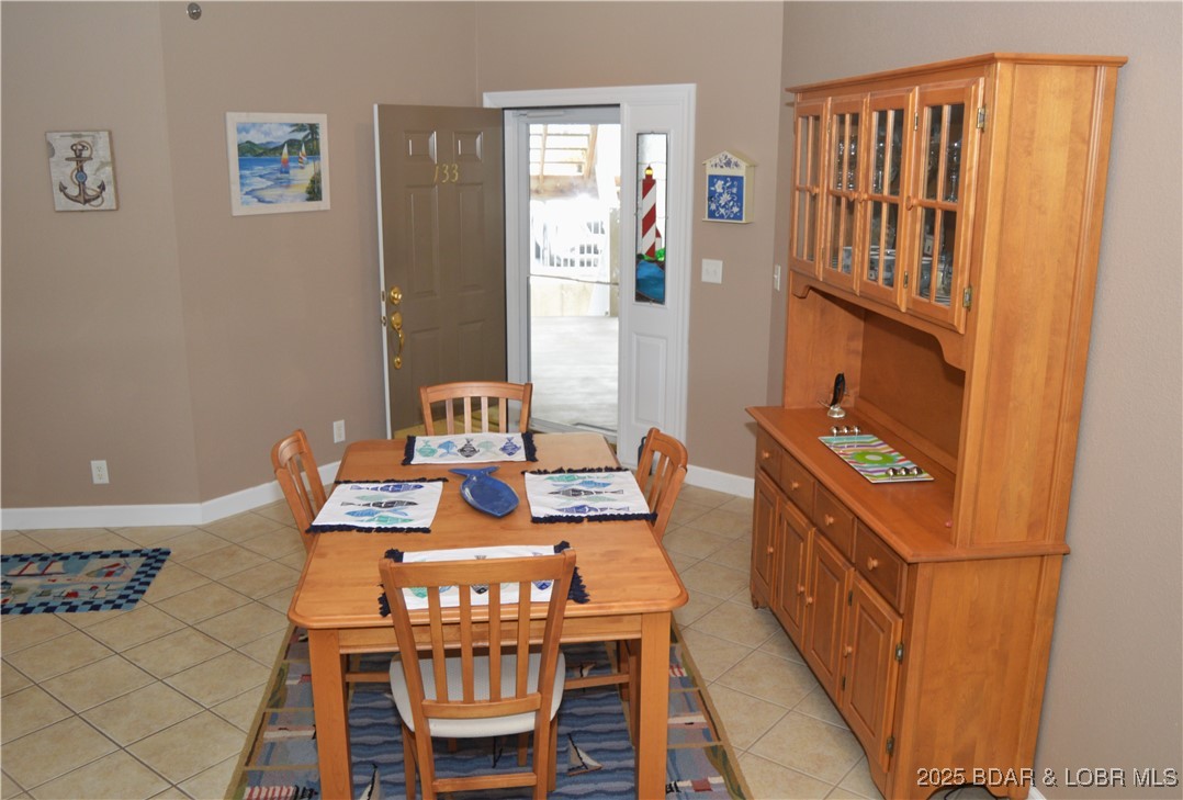 68 Lighthouse Road, Unit 133 Lake Ozark, MO 65049 - Photo 17 of 38 Dining area and entrance