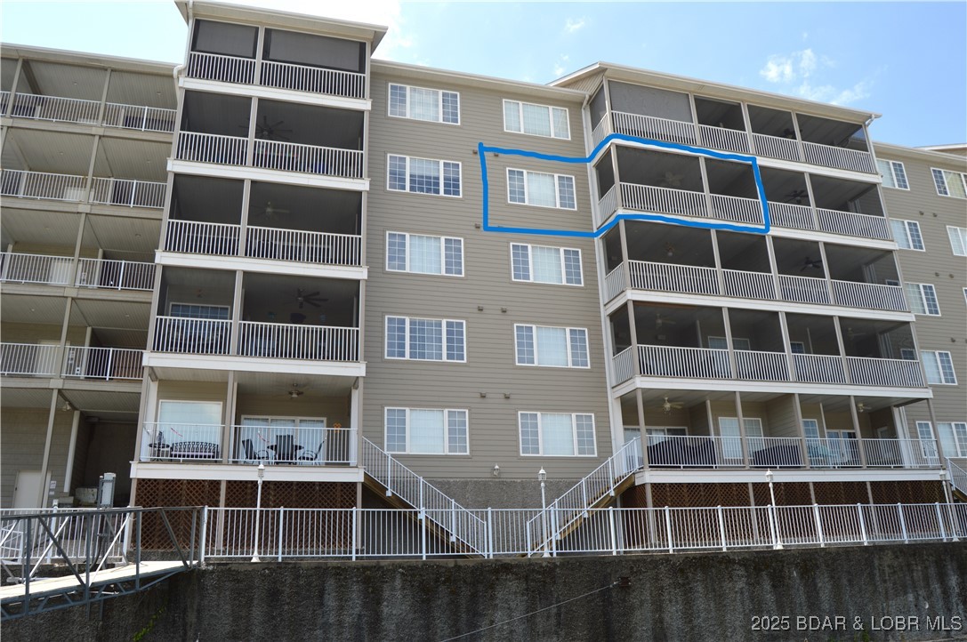 68 Lighthouse Road, Unit 133 Lake Ozark, MO 65049 - Photo 27 of 38 Lakeside view of condo