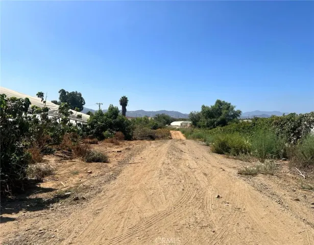 a view of lake with green space