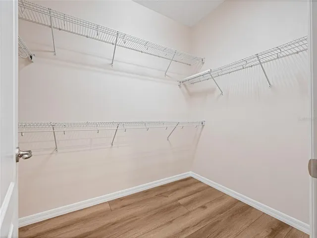 a view of a room with racks on the wall