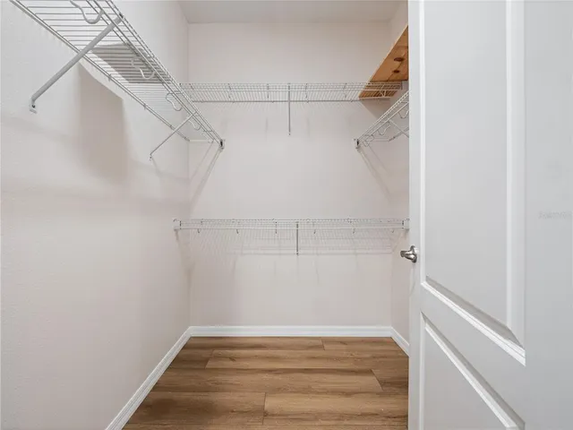 a view of a room with racks on the wall