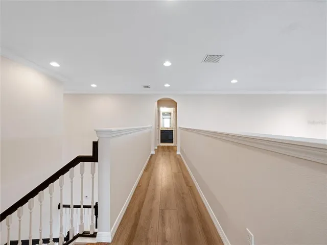 a view of entryway with wooden floor