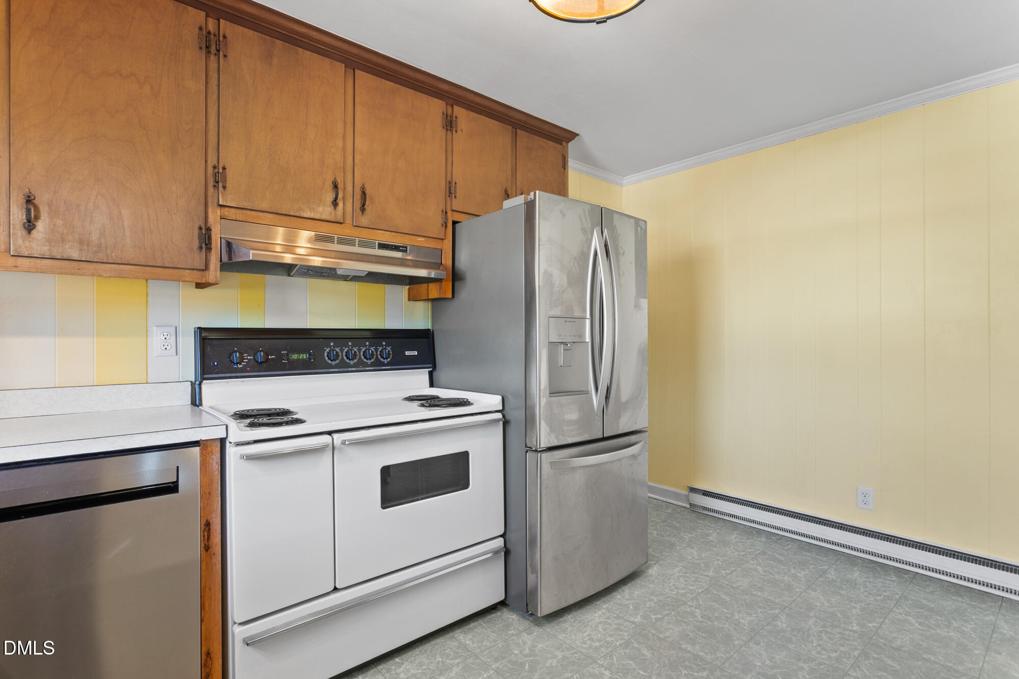 2221 Gerringer Mill Road Elon, NC 27244 - Photo 17 of 39 a kitchen with a refrigerator sink and cabinets
