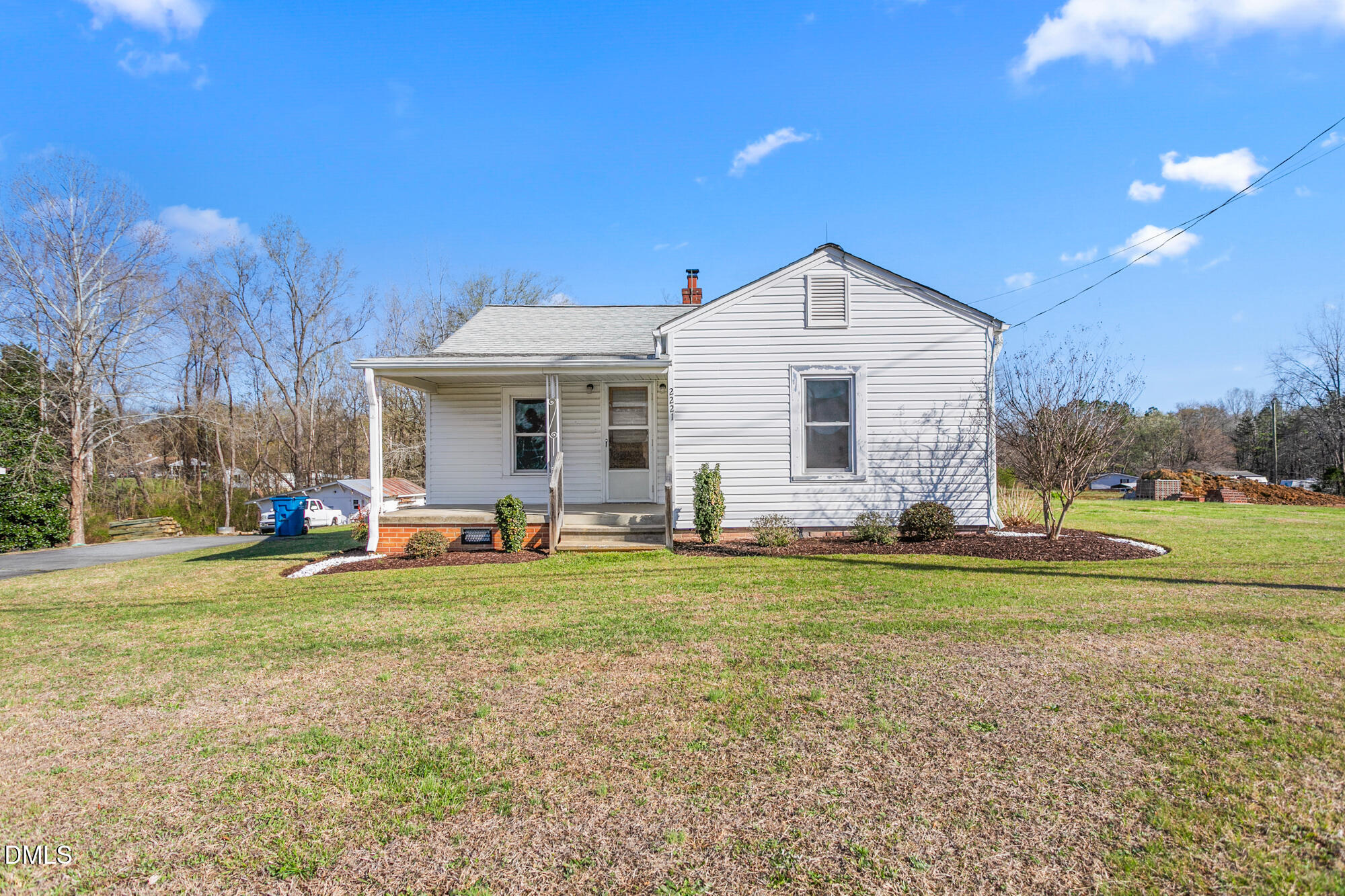 2221 Gerringer Mill Road Elon, NC 27244 - Photo 2 of 39 a view of a house with a yard and sitting area