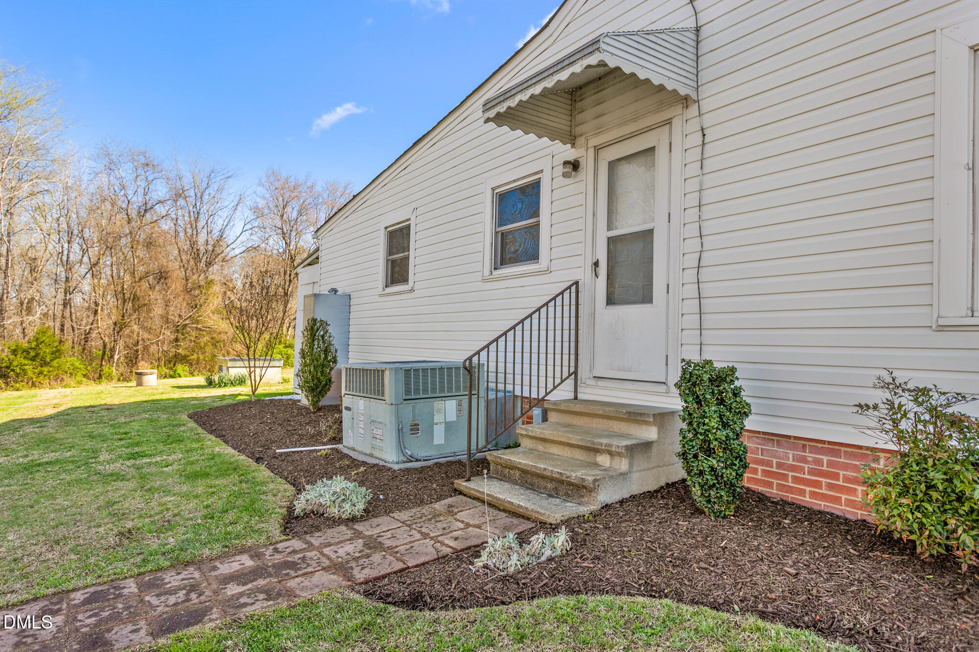 2221 Gerringer Mill Road Elon, NC 27244 - Photo 34 of 39 a view of a house with a yard