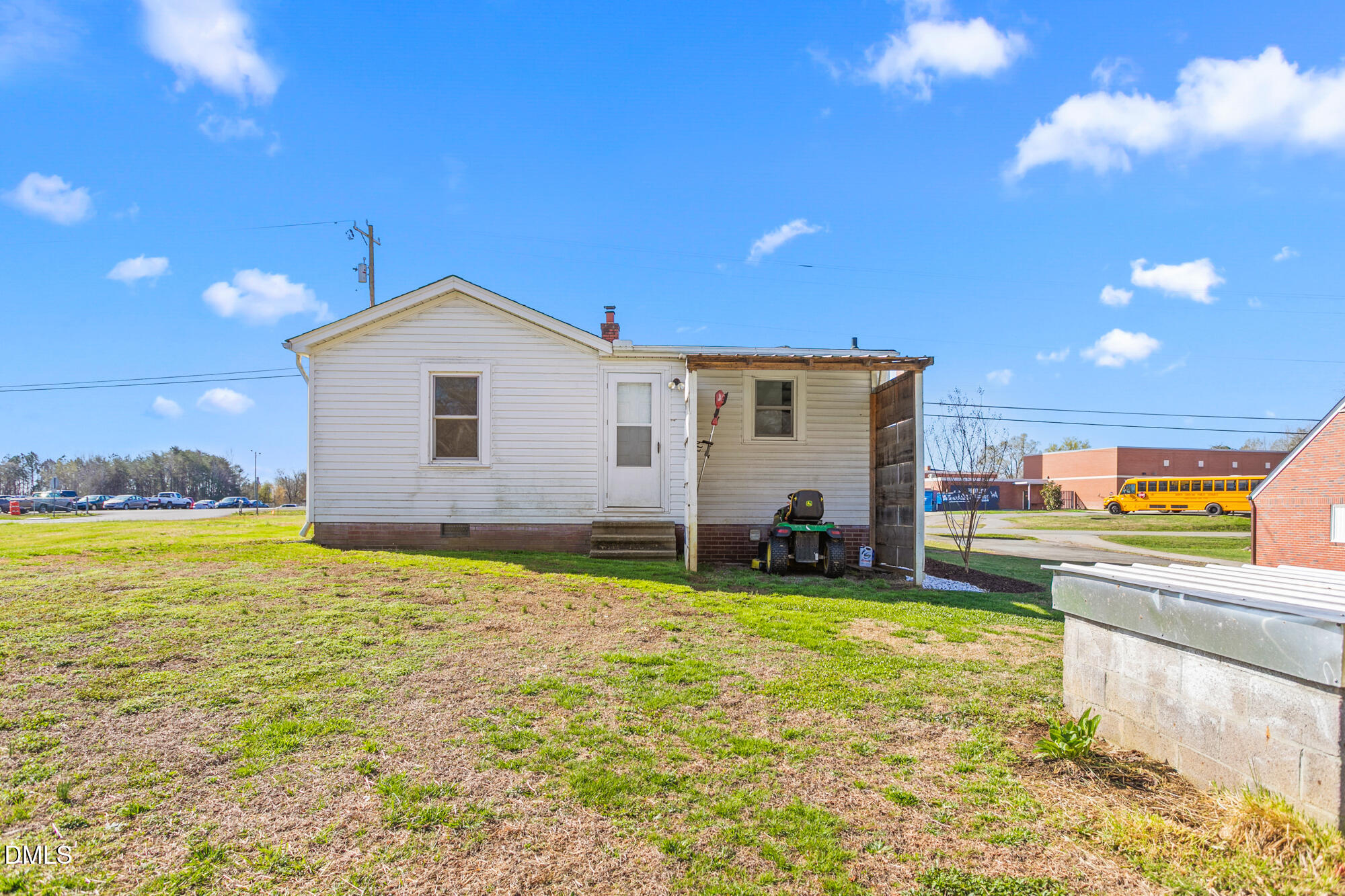 2221 Gerringer Mill Road Elon, NC 27244 - Photo 36 of 39 a view of a house with a yard