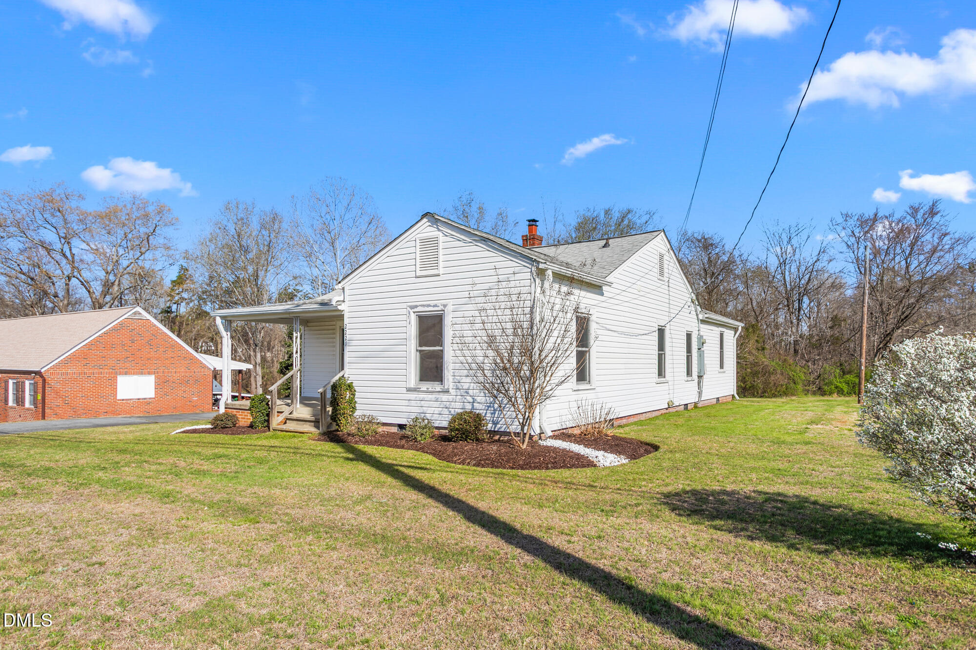 2221 Gerringer Mill Road Elon, NC 27244 - Photo 3 of 39 a view of a house with a yard