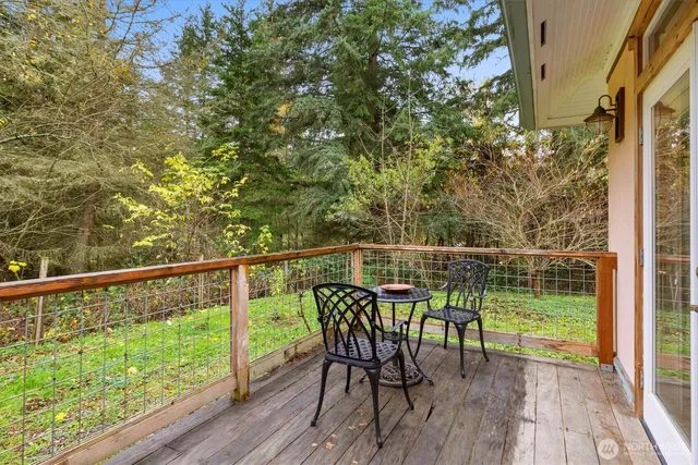 a view of a balcony with furniture