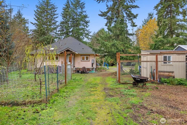 a house view with a garden space