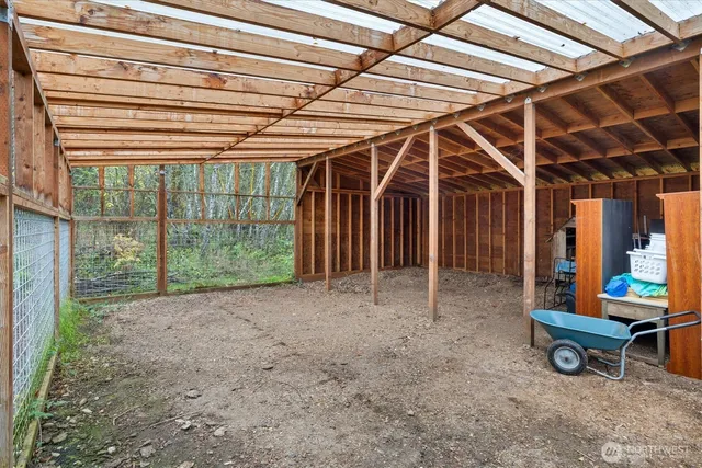 a view of a room with wooden walls
