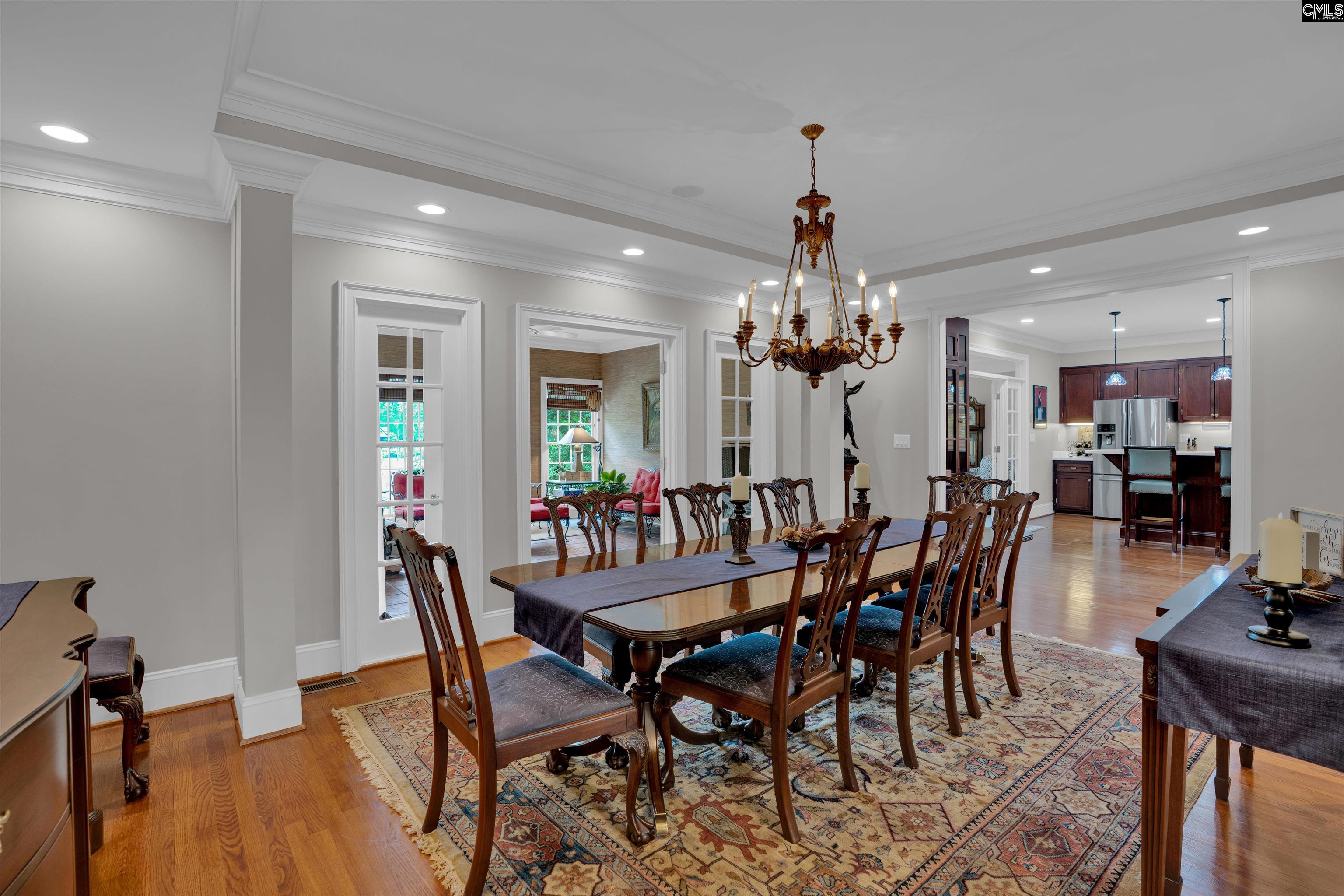 1101 Ellett Road Chapin, SC 29036 - Photo 5 of 24 a view of a dining room with furniture and wooden floor