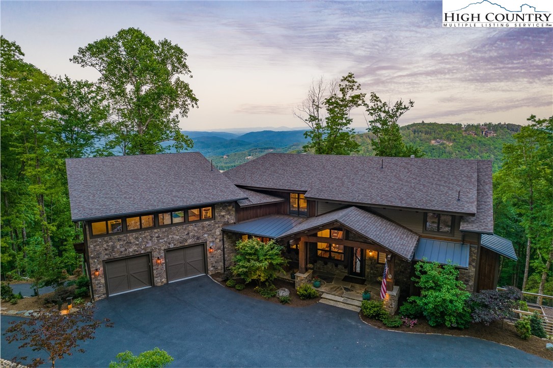 708 Goldenrod Road Boone, NC 28607 - Photo 1 of 49 an aerial view of a house with a yard and a sitting area