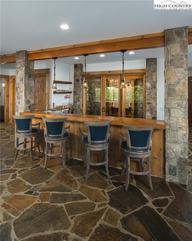 708 Goldenrod Road Boone, NC 28607 - Photo 31 of 49 a dining area with a table and chairs