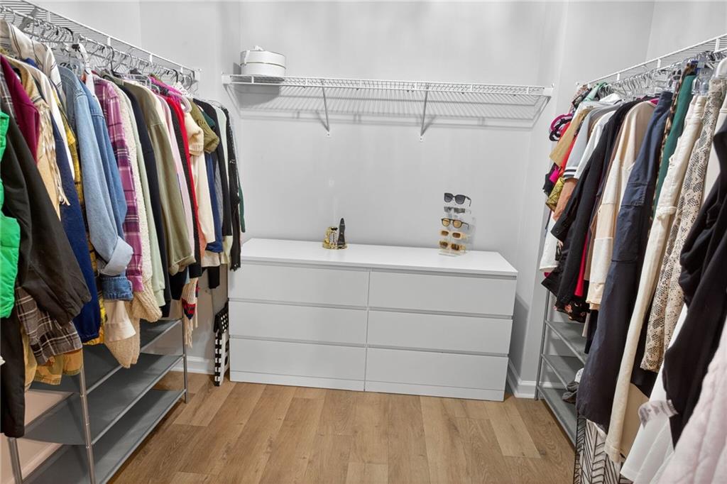 3333 Cascade Parc Boulevard Southwest Atlanta, GA 30311 - Photo 12 of 21 a view of walk in closet with clothes and shoes